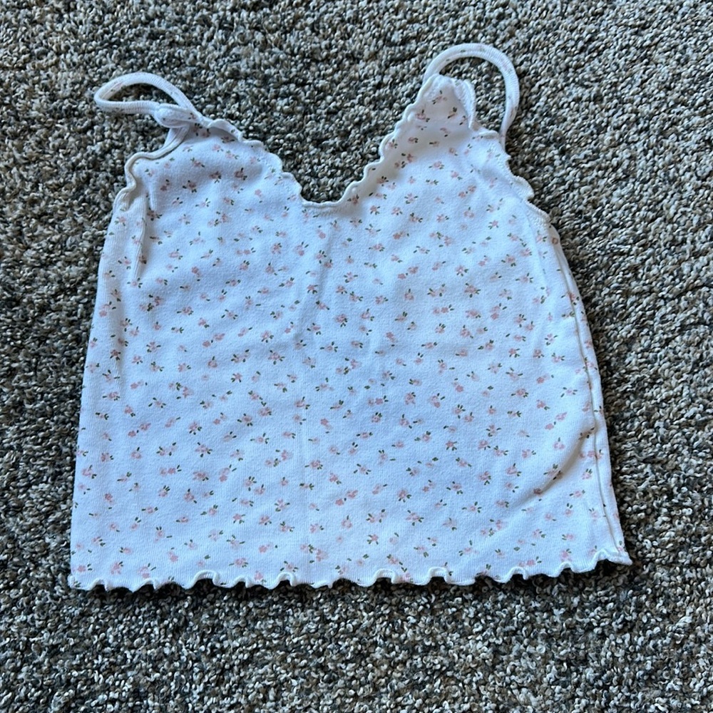 white tank top with flowers on it